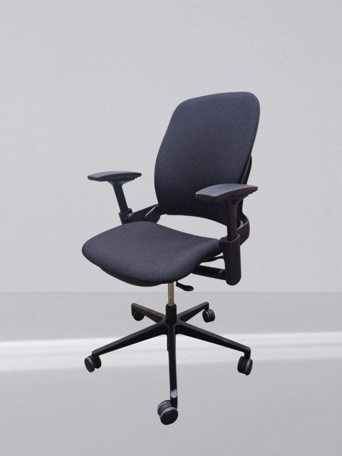 Steelcase leap v2 height adjustable arm in new black fabric